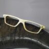 White Buffs Glasses kept on top of black buffalo horn