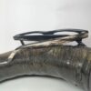 horn rimmed reading glasses kept on top of buffalo horn
