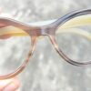 reading glasses for women in hand