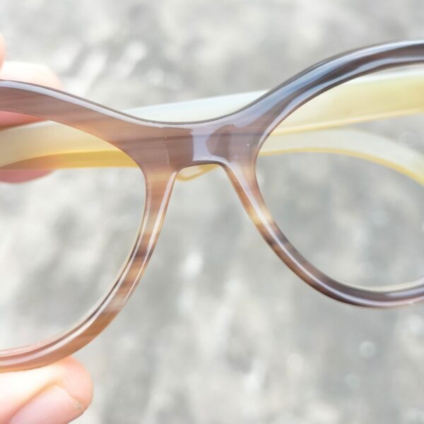 reading glasses for women in hand
