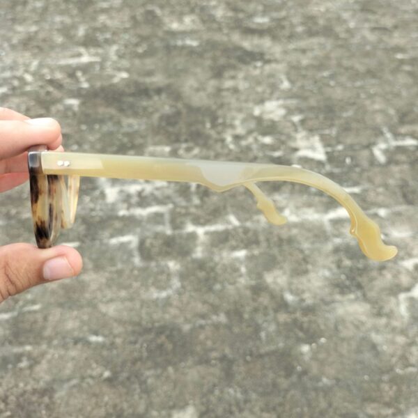 reading glasses for women in hand