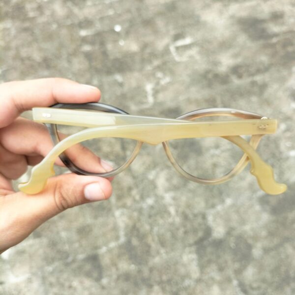 reading glasses for women in hand